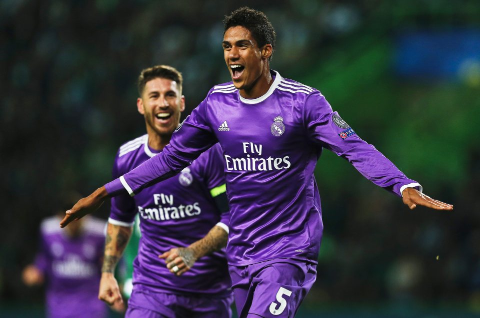  Raphael Varane celebrates after putting Madrid in the lead after Ronaldo's flick-on