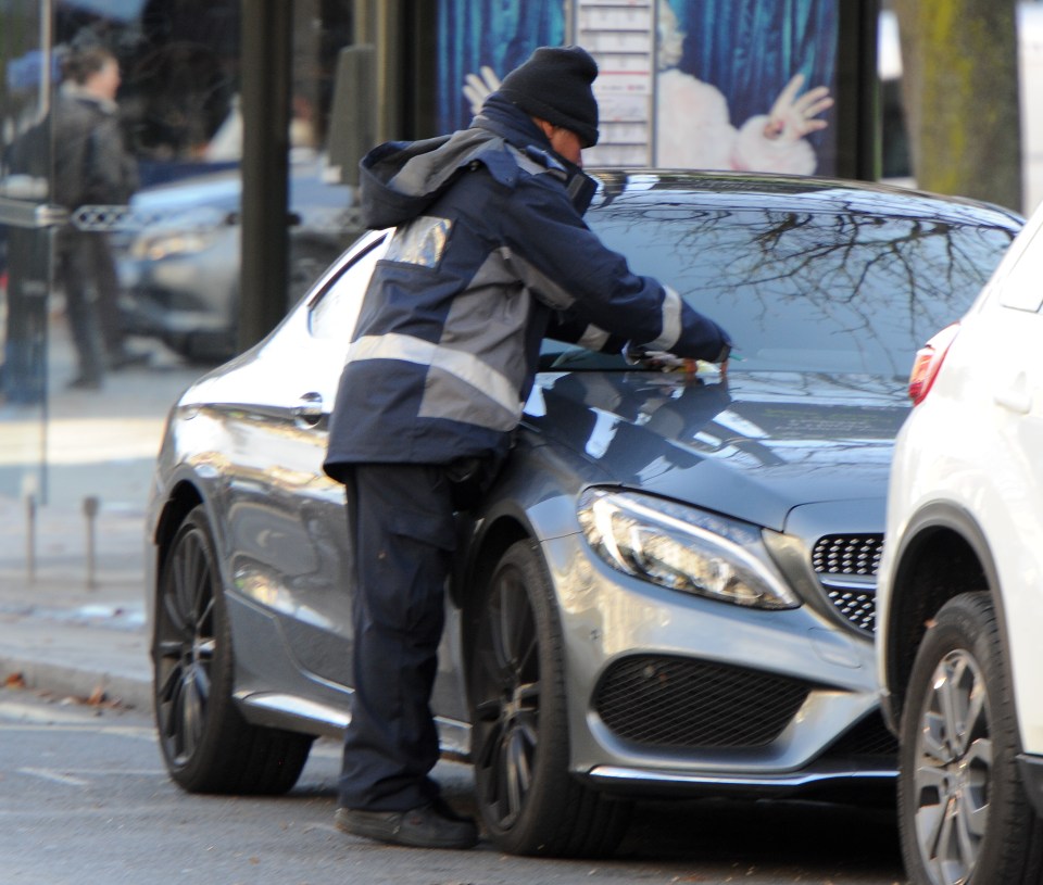  It looked like the traffic warden was watching to see if Brooklyn would pay for parking and when he didn't, he swiftly fined him