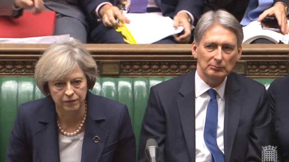  Theresa May sits next to Philip Hammond, as he prepares to deliver his first Autumn Statement