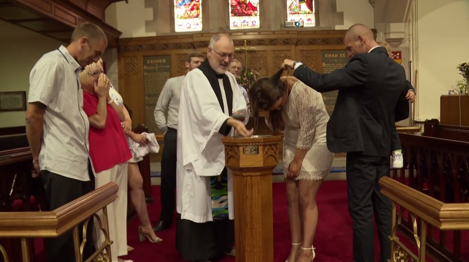 The couple make it through the day with no hitches and Ste even lovingly holds Amber's hair out of the way as she is baptised