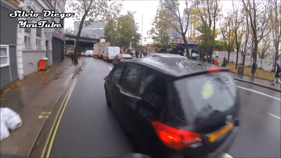 He then precariously overtakes the cyclist, cutting him up closely