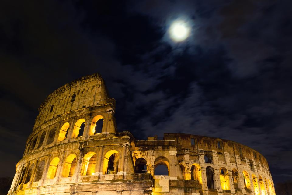 The Coliseum under the full moon, Rome, Italy