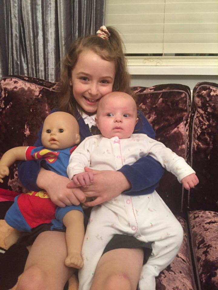  Older sister Libby with sister Elsie and a toy doll