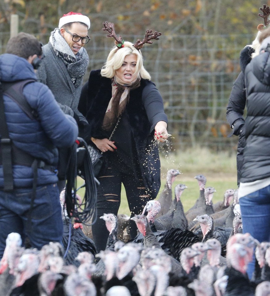  Gemma gave the turkeys some feed as Bobby looked on in disgust