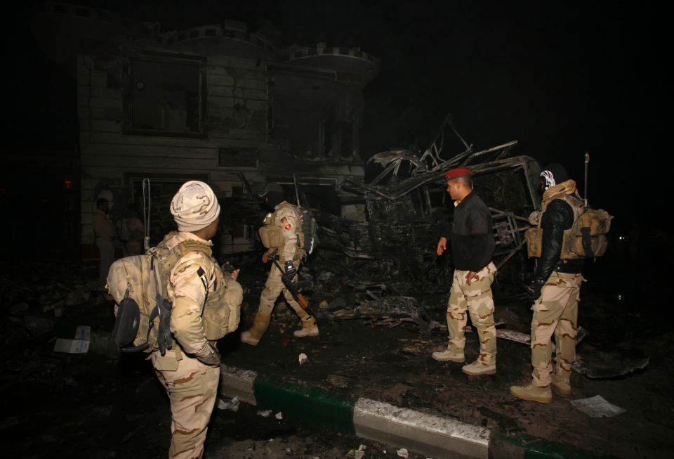  Iraqi security forces at the scene of the blast