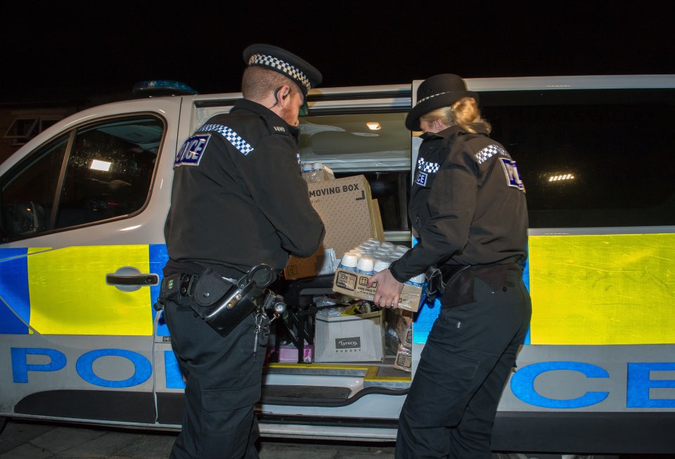  Police taking away Bennell's in yesterday's raid