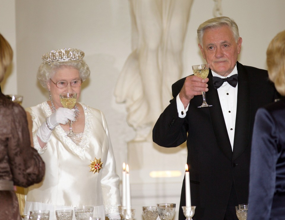  The Queen raises a toast during her visit to the Baltic states