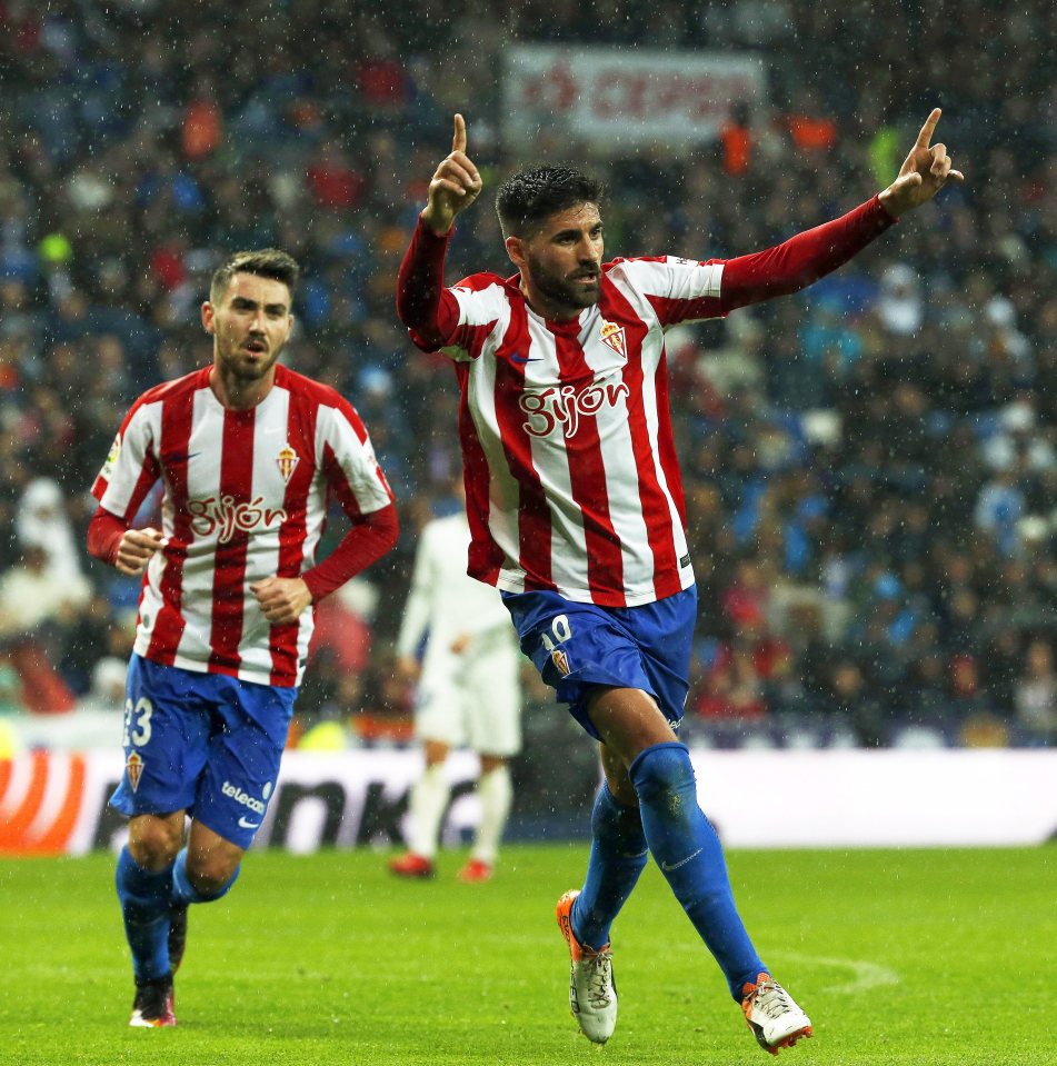  Carlos Carmona celebrates as his goal for Sporting gave them a way back in