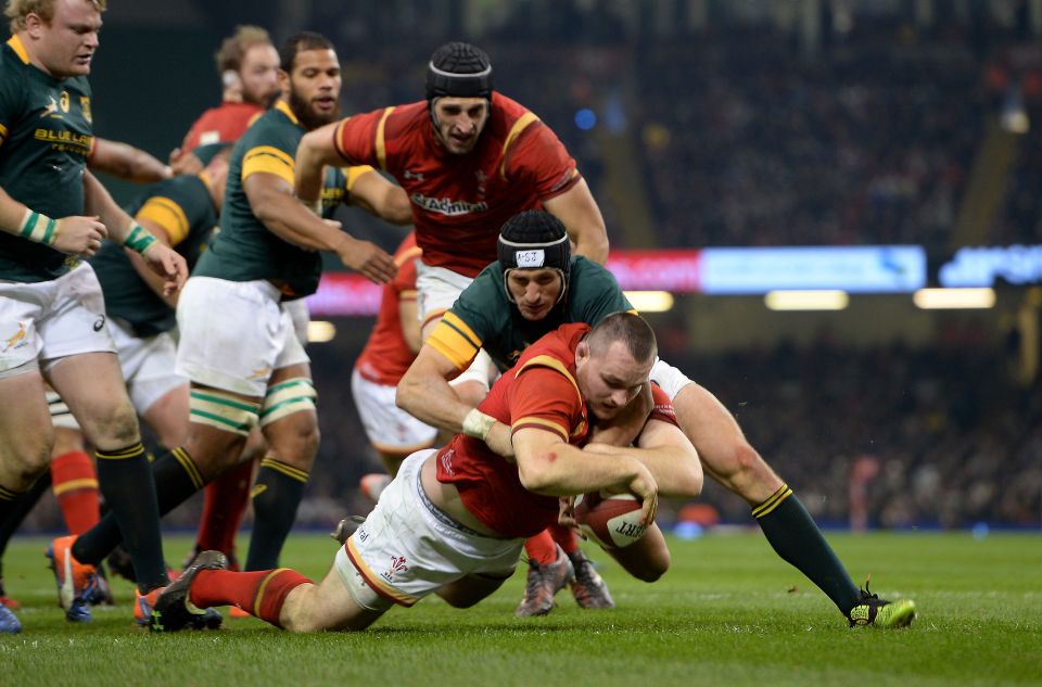  Ken Owens crashes over to score a try for Wales