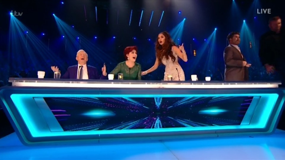  During Honey G's stage invasion, Simon rushed to help her, Nicole looked shocked, Louis carried on talking and Sharon thought it was hilarious fun