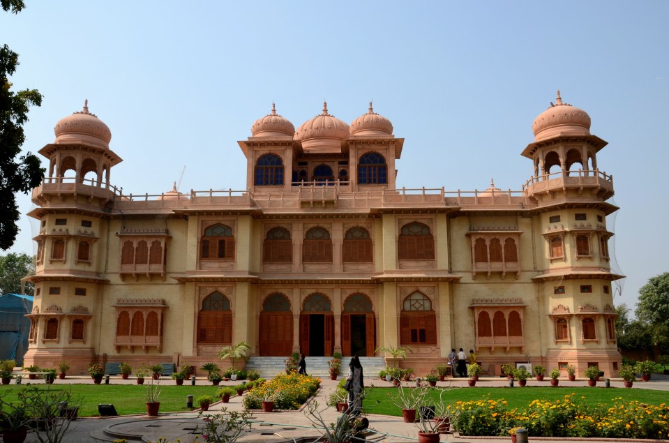 Visitors wander gardens of Mohatta Palace Museum Karachi Sindh Pakistan