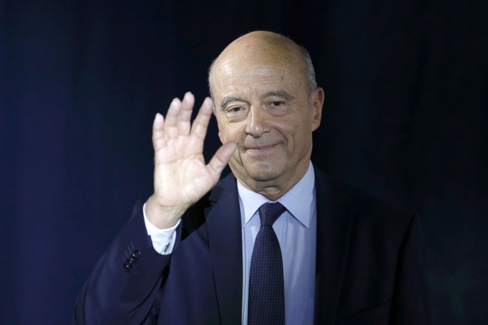  Juppe after he delivered his speech to recognise his defeat