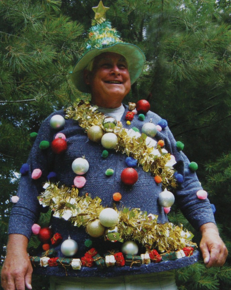  This man is doing a brilliant impression of a Christmas tree