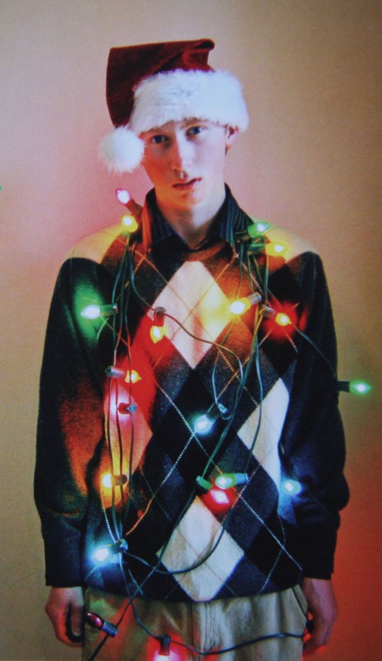  If your sweater isn't Christmassy enough, you can always just stick some fairy lights to yourself