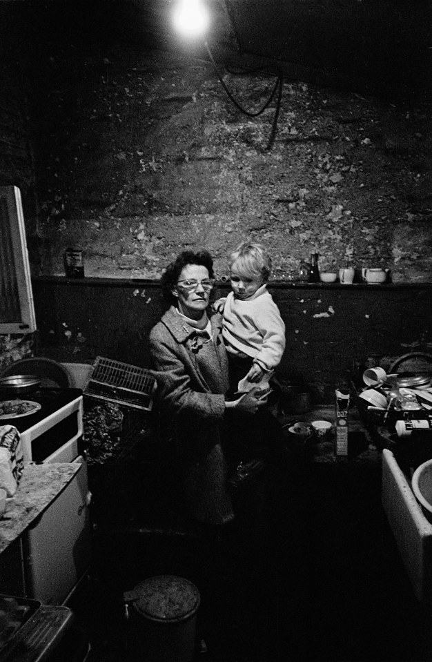  Mother and son in foul kitchen basement Battersea 1970