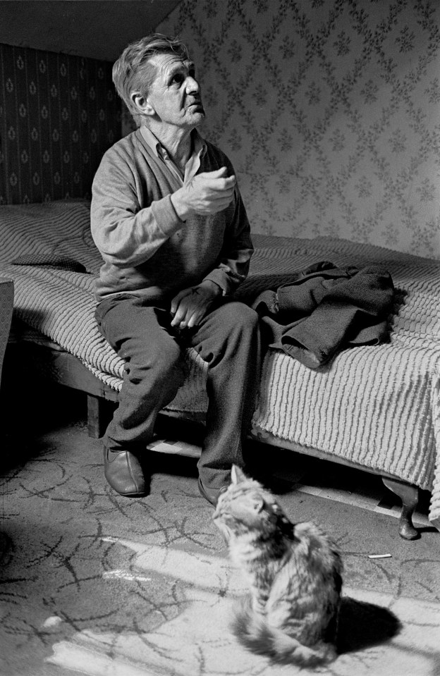  Mr. Thackeray, a retired seaman, Newcastle West End, June 1971 with his cat