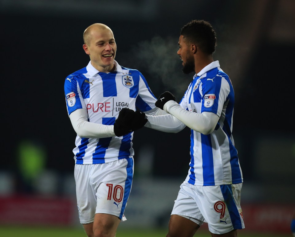  Aaron Mooy (l) equalised soon after the restart - but it was short-lived