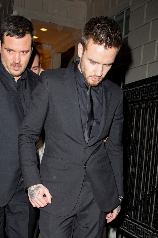  The One Direction star was surrounded by security guards as he left the venue