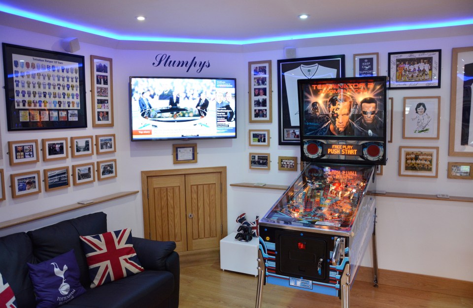 His new pinball fits in nicely among the dart board and pool table