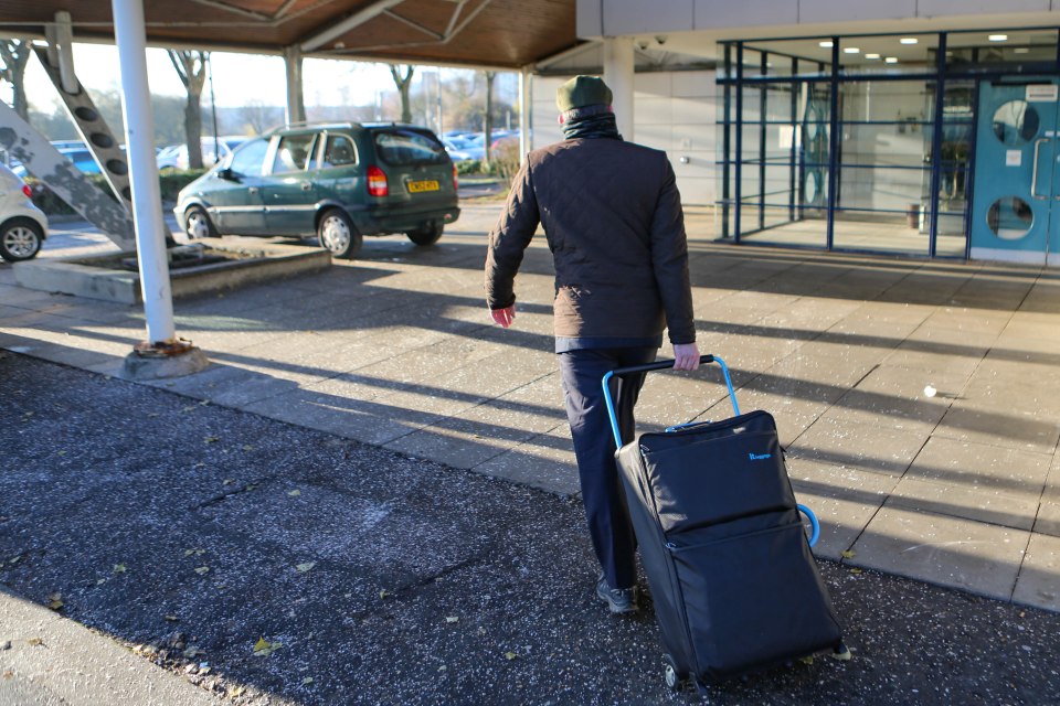  Ball carried a suitcase as he walked into court soon before being jailed for 12 years