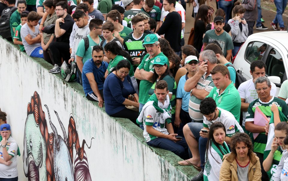 Fans of Chapecoense soccer team are pictured in front of the Arena Conda stadium in Chapeco