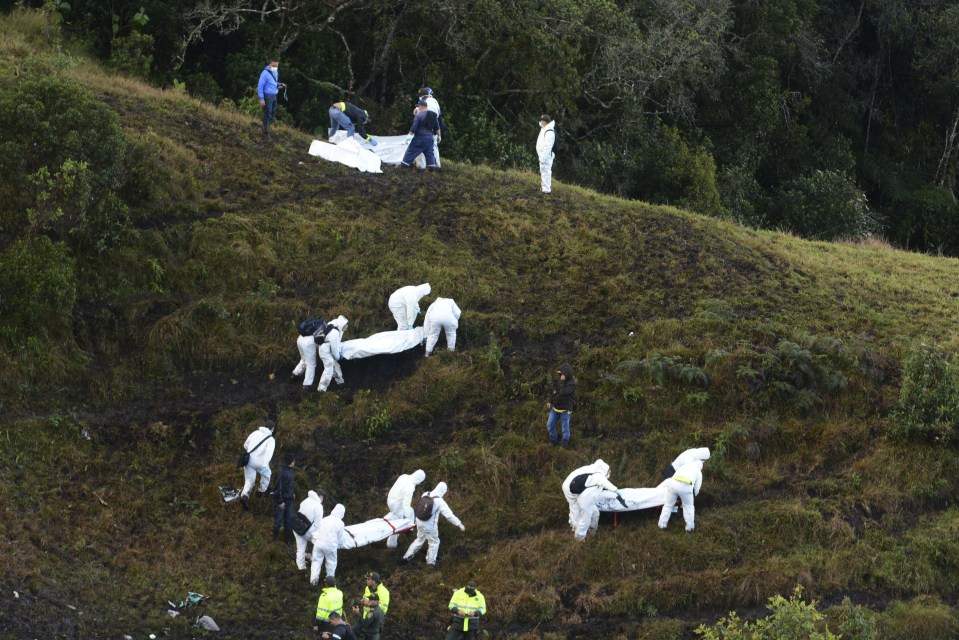 Rescuers were faced with the grim task of recovering bodies from the scene of this crash this morning