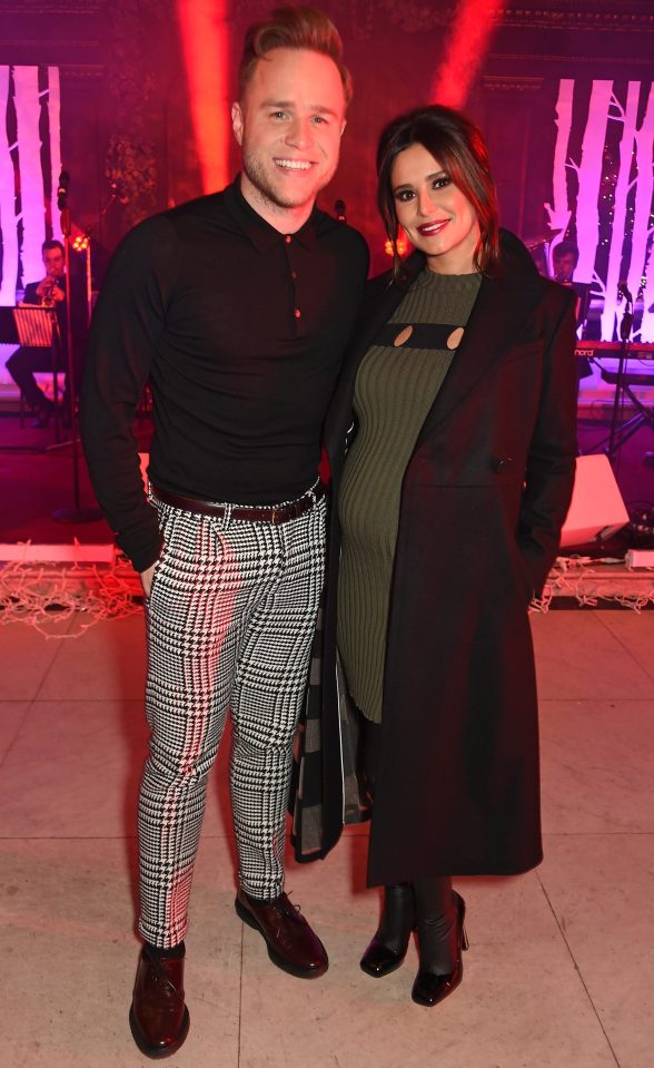  Cheryl also posed with Olly Murs who performed at the event