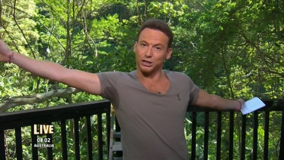  I'm A Celebrity's Extra Camp's Joe Swash made the bold choice of wearing a grey T-shirt in a tropical climate