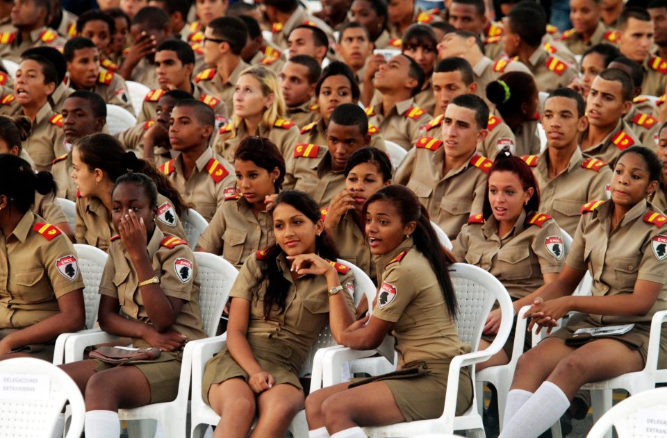  Cuban military students chat before last nights tribute