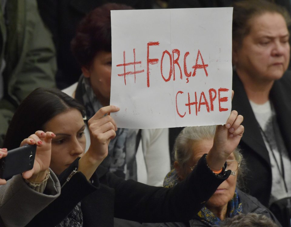  A woman at Pope Francis' weekly audience holds a placard reading 'Força Chape' in memory of Chapecoense