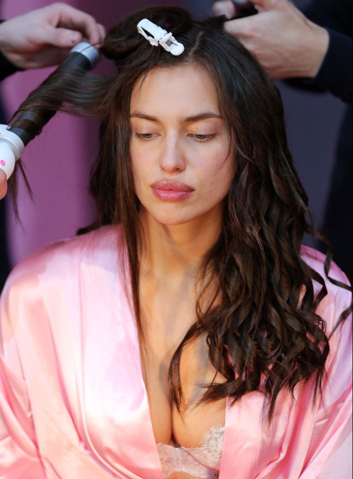  Irina gets primped for the big event thanks to a host of stylists