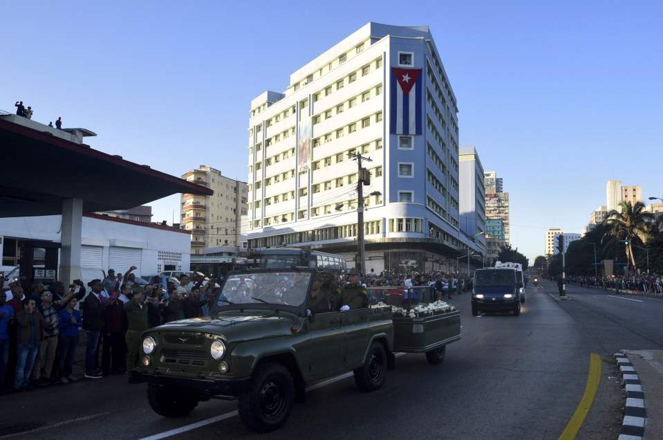  The remains of the Commandante' are being transported by military vehicle