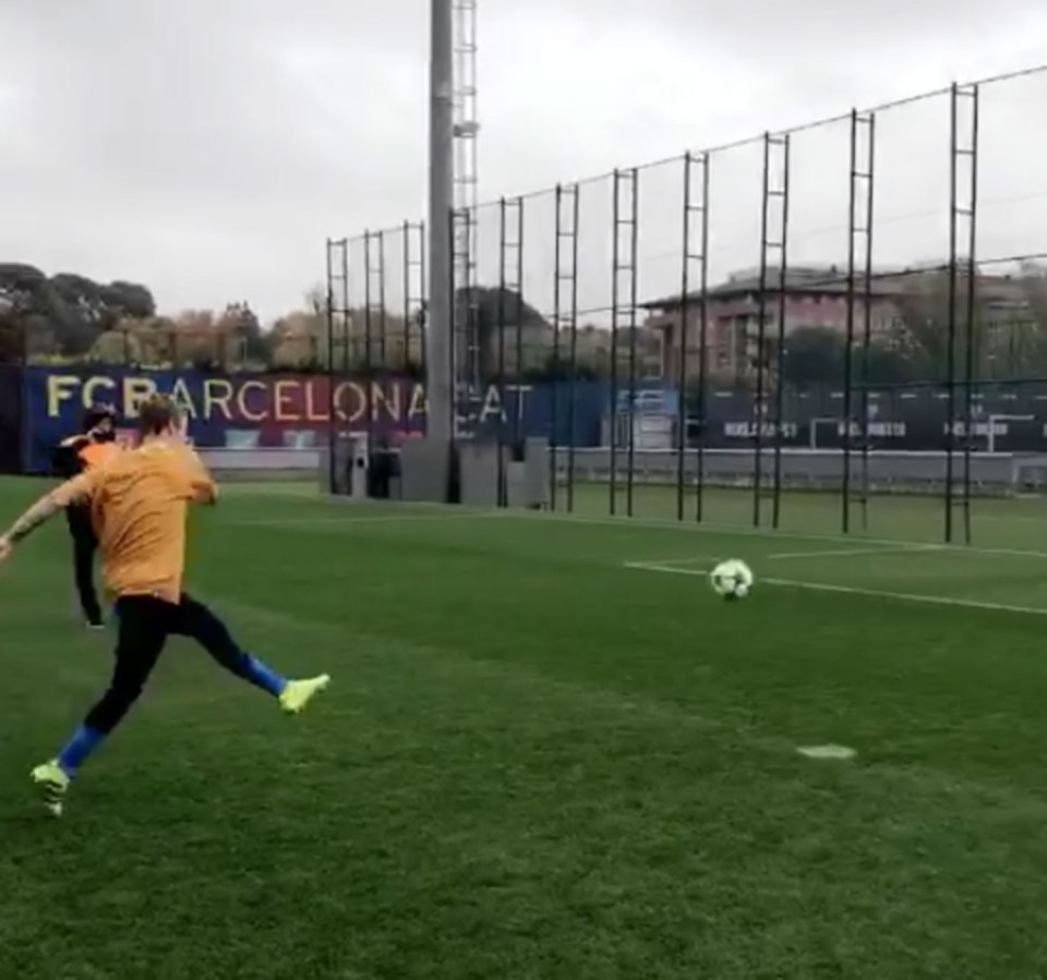  Wearning a gold football top, he took some shots during a kickabout