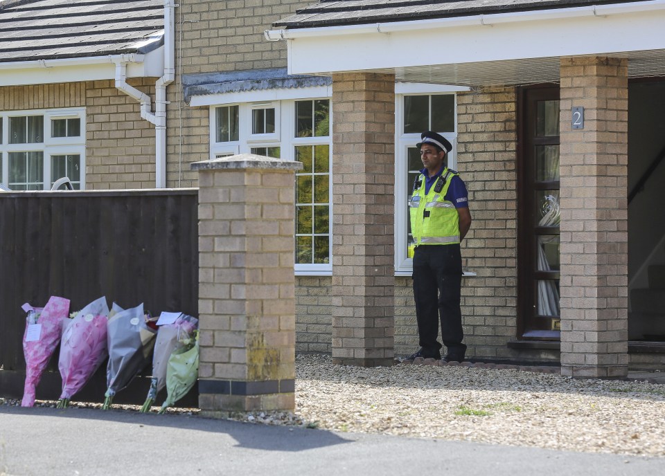  Policeman standing guard at the Hart's family home in the village of Moulton near Spalding