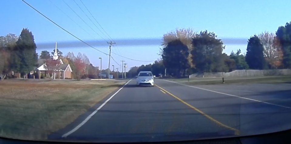 Silver Prius is caught on camera speeding up out of nowhere 