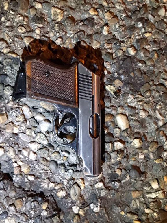  The gun used in the attack was pictured on the ground a short distance from the shooting