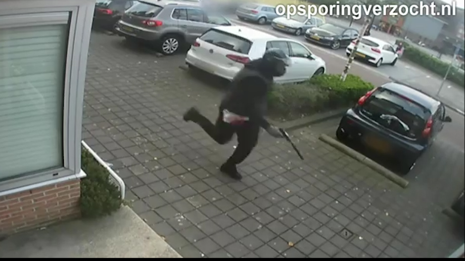  The gunman jumps back onto the scooter and chases the victim, firing more shots