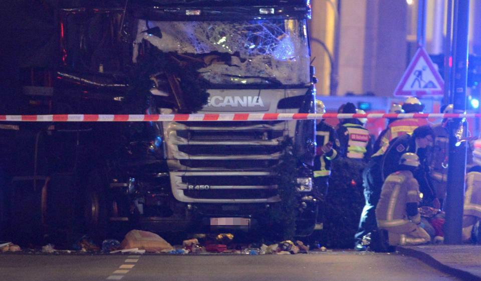  Horror attack ... The huge truck ploughed into crowds of revellers at the Berlin Christmas market