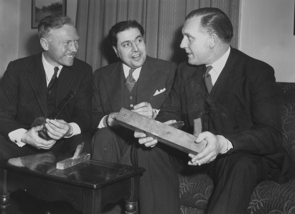  Three of the 33 former prisoners of Colditz Castle. From L-R; Major Pat Reid, Lieutenant Alan Campbell and Captain Dick Howe