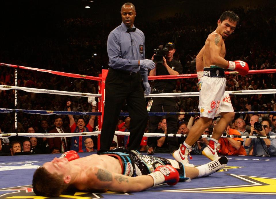  Hatton after being knocked out by Manny Pacquiao