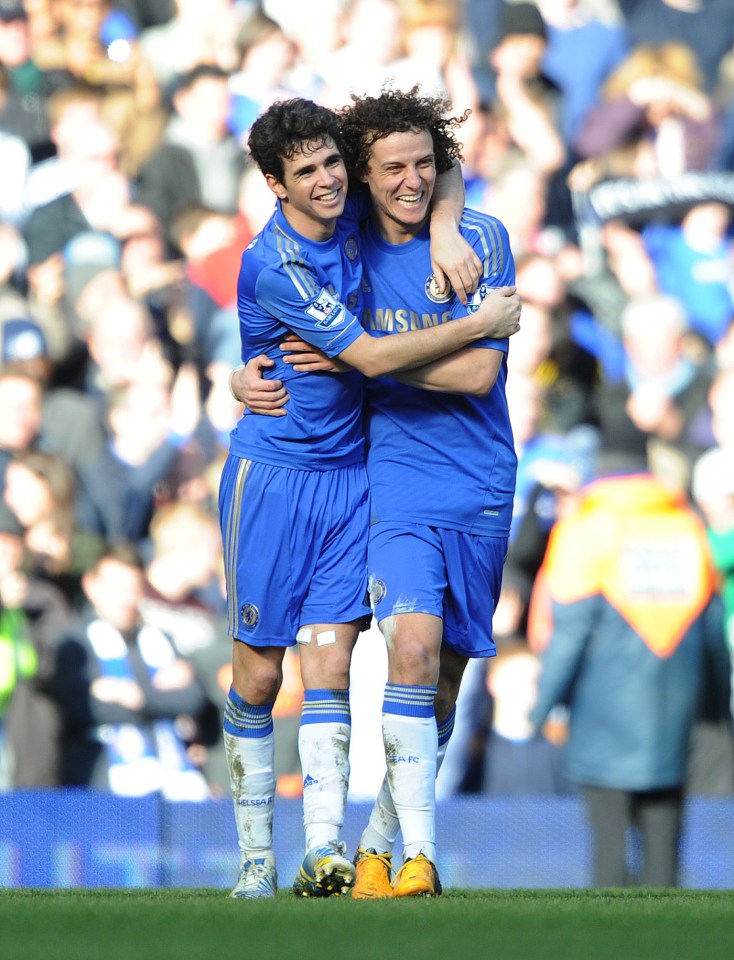  Oscar celebrates with David Luiz after his goal helped Chelsea to an FA Cup fourth round victory over the Bees in 2013