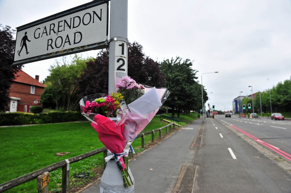  Tribute . . . at spot where car hit cop in Sutton