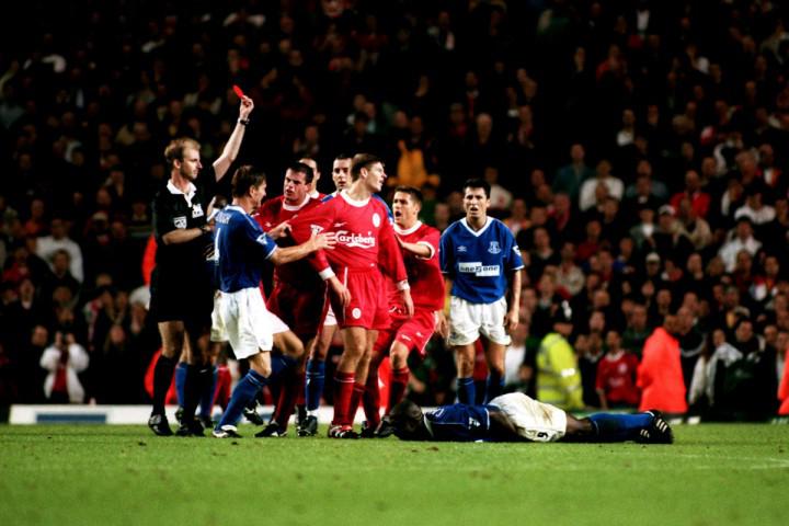  Steven Gerrard is shown a red card after a chest-high tackle on Kevin Campbell in 1999