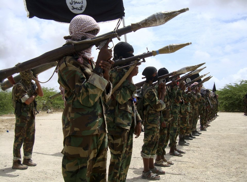  Al Shabaab militants parade new recruits after arriving in Mogadishu