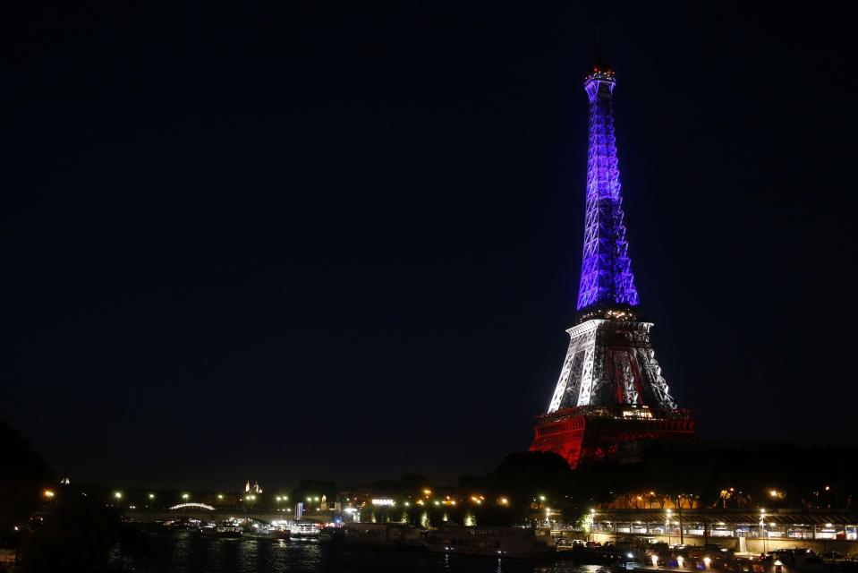  The iconic Eiffel Tower illuminated with the colours of the French National flag in tribute for the victims of the deadly Bastille Day attack on July 15