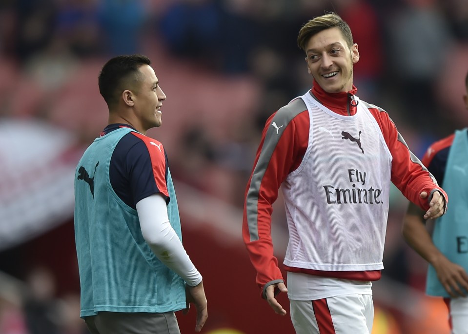  Chelsea and Shanghai have the money to split up Mesut Ozil and Alexis Sanchez