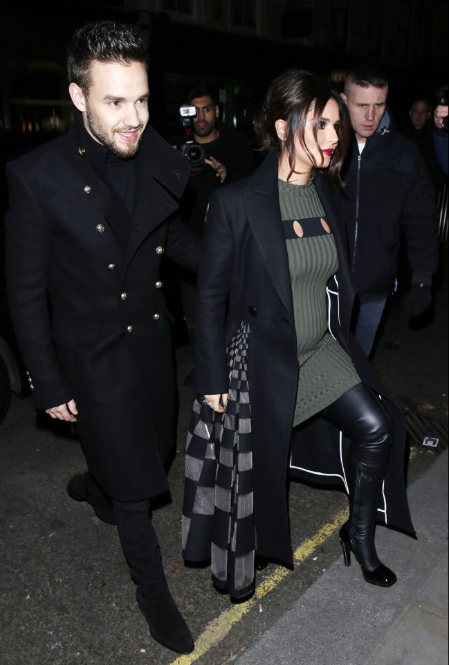  Cheryl opted for a clinging jumper dress - leaving no mistaking that she is withchild