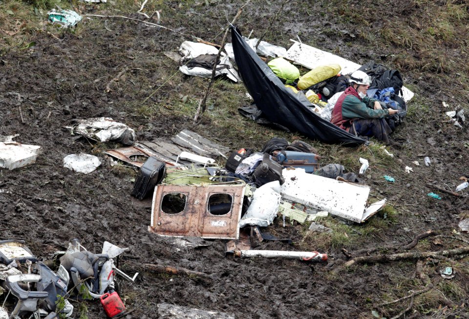  Rescue workers rushed to the plane crash site that claimed dozens of lives