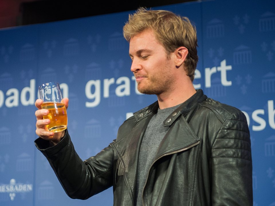 Nico Rosberg enjoys and apple wine while celebrating his F1 championship win