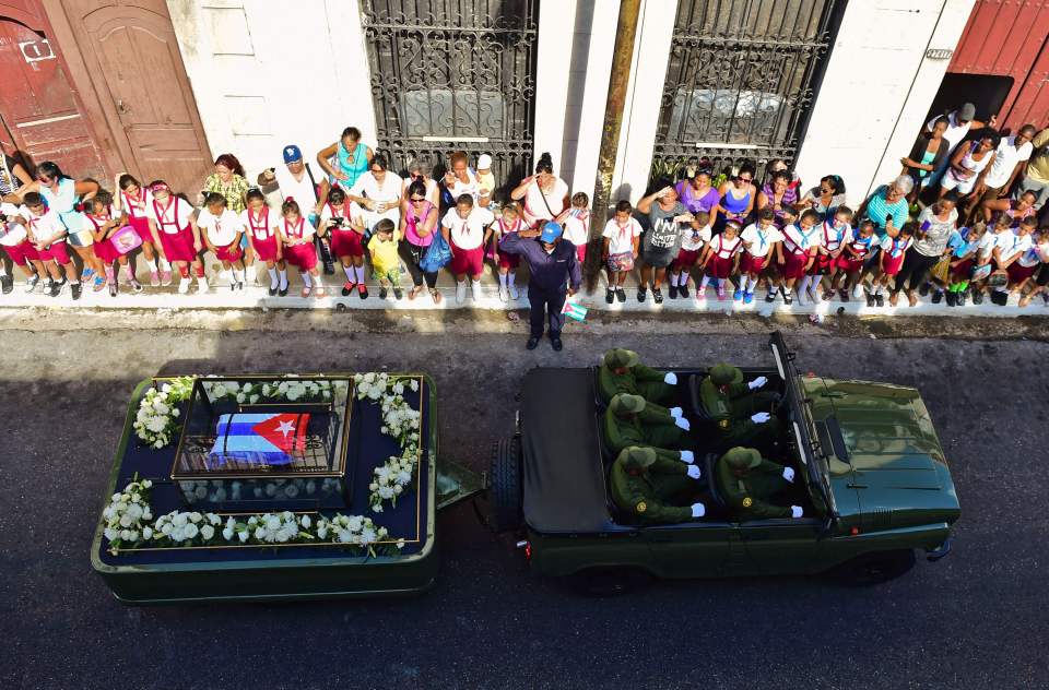  The streets were lined with hundreds of thousands of flag-waving Cubans